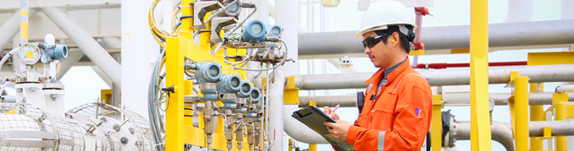 Man inspecting pipes